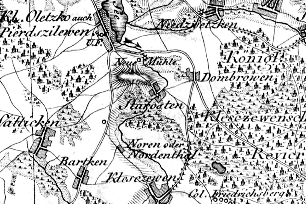 Fragment starej mapy przedstawiający miejscowości i lasy dawnych Prus Wschodnich, m.in. Kl. Oletzko, Dombrowen, Bartken i Nordenthal. Widoczne są drogi, rzeki, wzgórza i tereny zalesione. Mapa ma charakter historyczno-topograficzny.