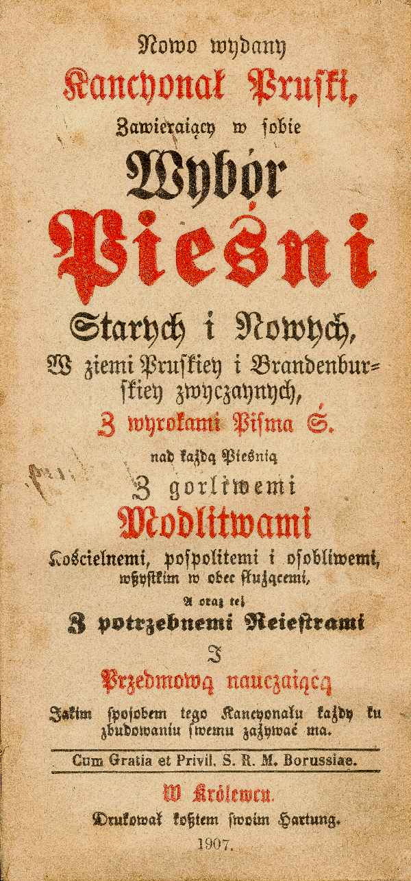 Strona tytułowa dawnego śpiewnika wydrukowanej ozdobnym krojem pisma. Historyczny druk zawiera dekoracyjny tytuł oraz informacje o wydaniu publikacji.